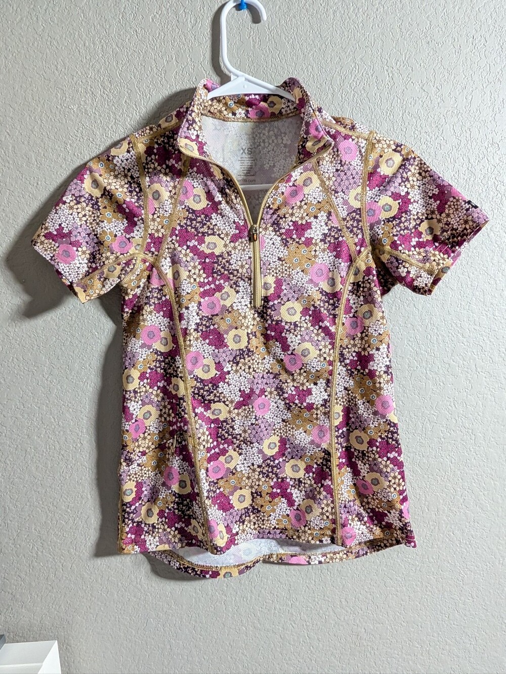 Kerrits Floral Short Sleeve Zip Kids Top in Pink, Purple & Gold
